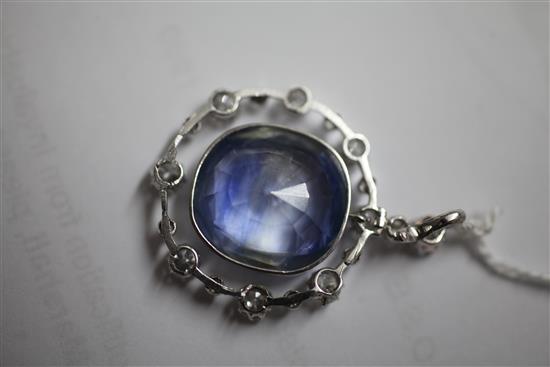 A white gold, sapphire and diamond drop pendant, 38mm inc. bale.